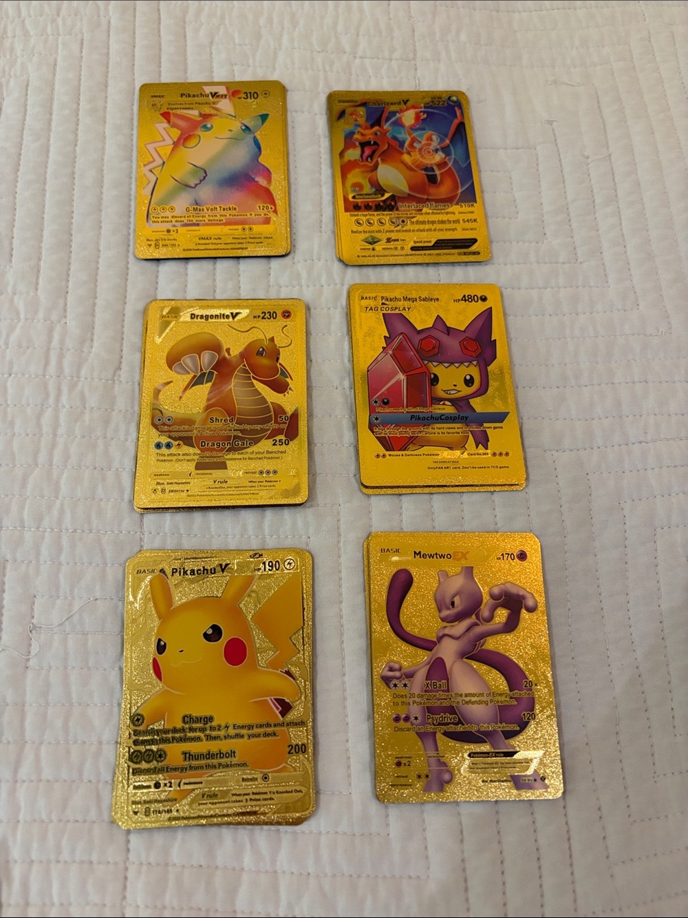 Gold play Pokeman cards